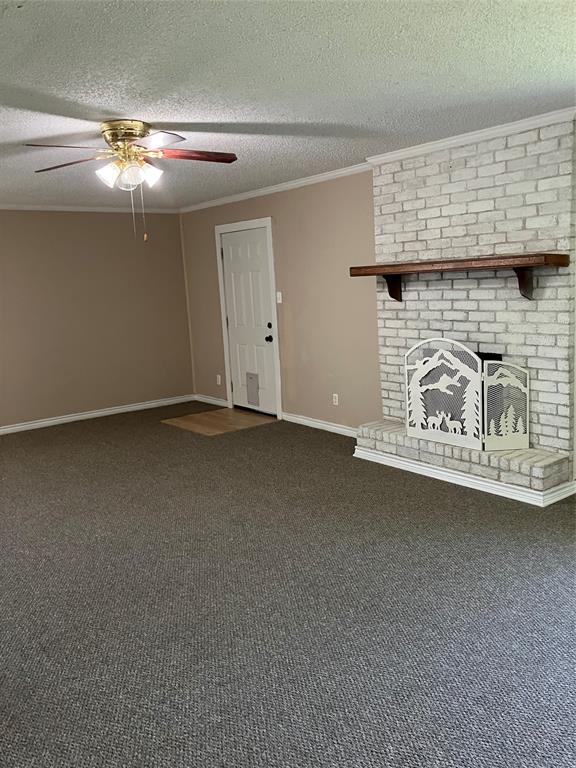 717 Bluebonnet Street Mexia, TX 76667 - Photo 7 of 25 a view of a fireplace