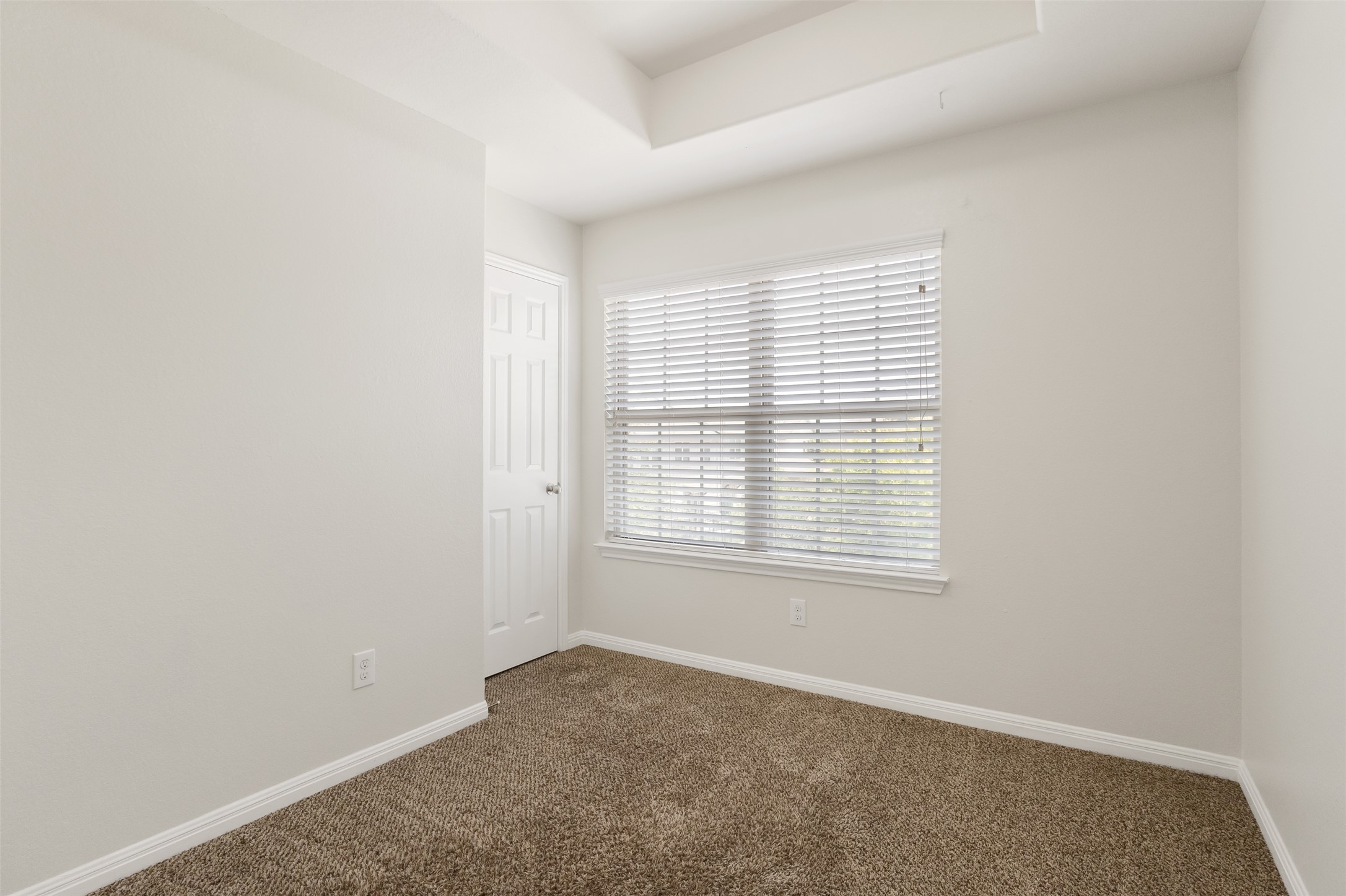 1510 Catalan Road, Unit 602 Austin, TX 78748 - Photo 24 of 36 Carpeted empty room with baseboards