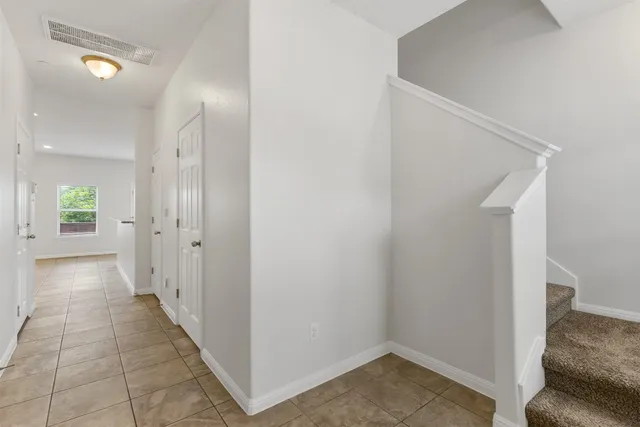 a view of livingroom with furniture and front door