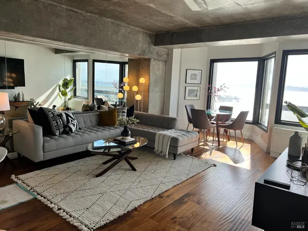 a room with furniture and a flat screen tv