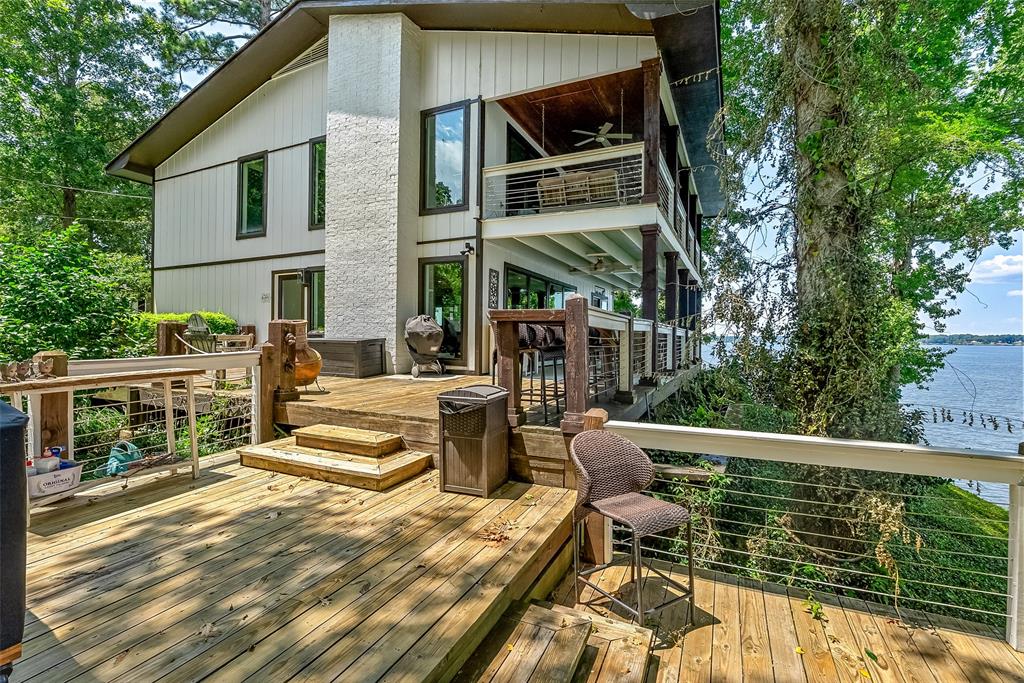 128 Knott Drive Many, LA 71449 - Photo 2 of 39 a view of balcony with two chairs and a table