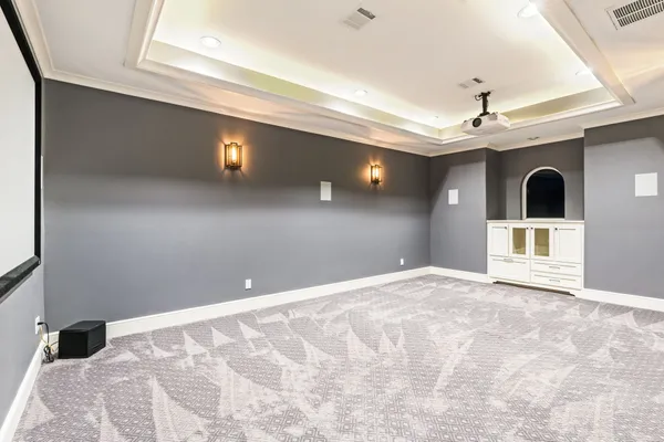 a view of an empty room with a fireplace