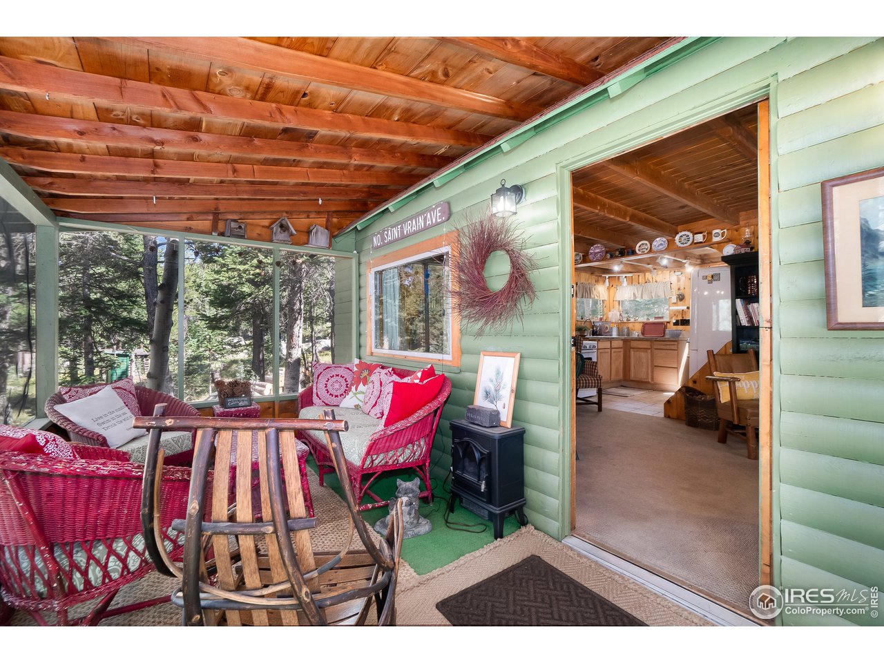 78 Peaceful Valley Road Lyons, CO 80540 - Photo 5 of 27 Porch and entry to cabin