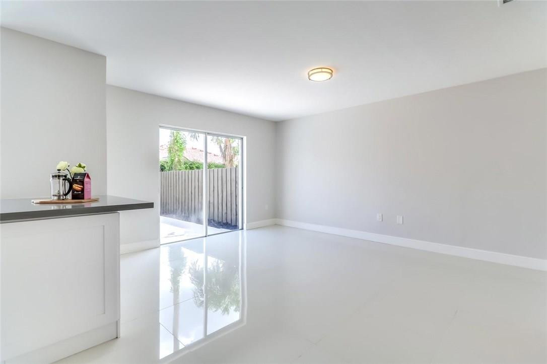 8237 Northwest 200th Terrace Hialeah, FL 33015 - Photo 12 of 30 a view of an empty room and window