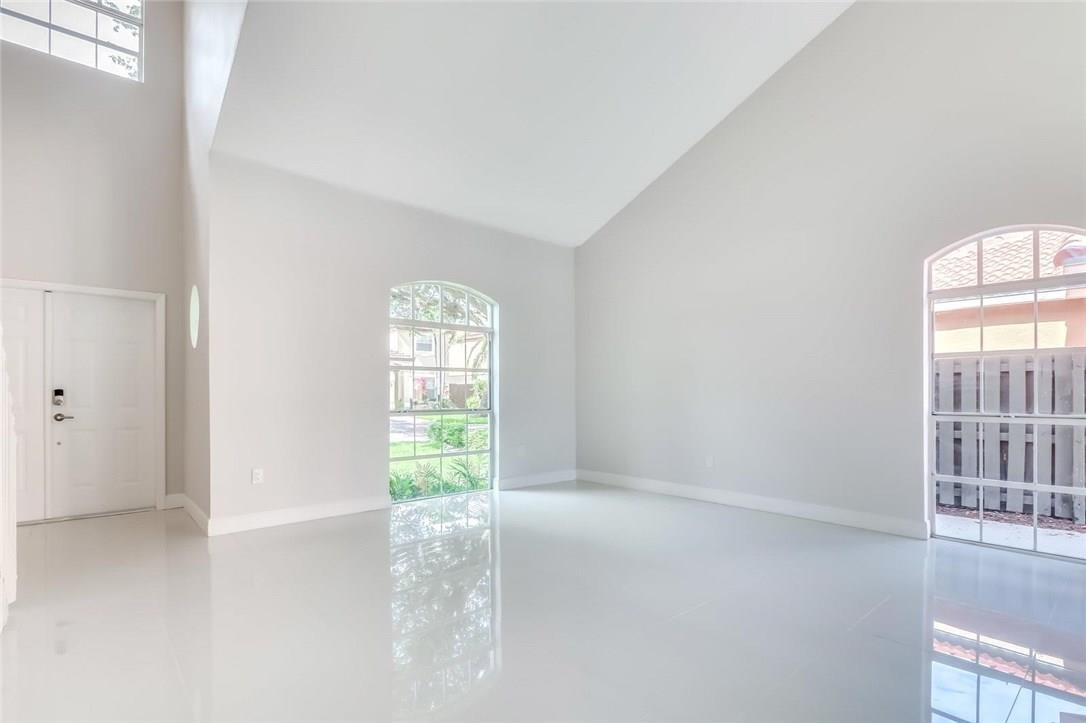 8237 Northwest 200th Terrace Hialeah, FL 33015 - Photo 4 of 30 an empty room with windows