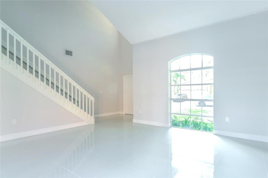 8237 Northwest 200th Terrace Hialeah, FL 33015 - Photo 5 of 30 a view of an entryway with a window
