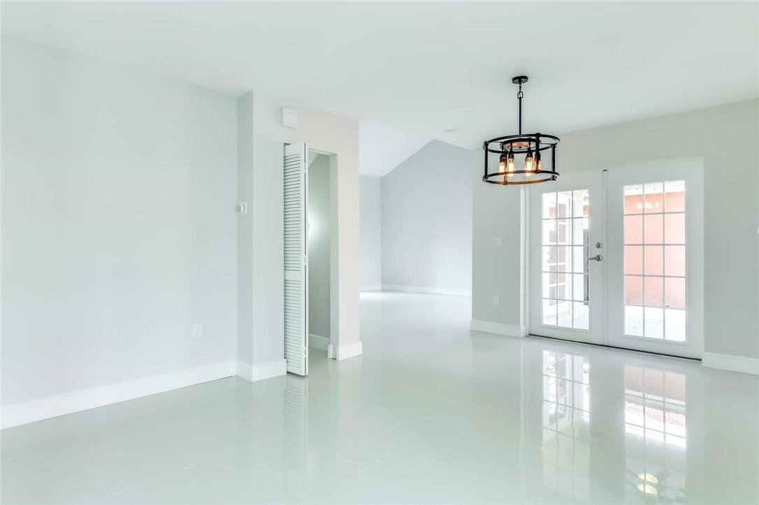 8237 Northwest 200th Terrace Hialeah, FL 33015 - Photo 7 of 30 a view of an empty room with a window