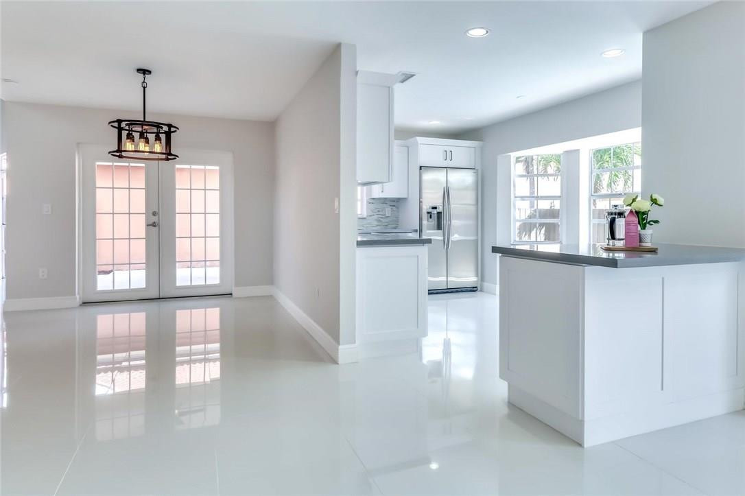 8237 Northwest 200th Terrace Hialeah, FL 33015 - Photo 8 of 30 a view of entryway and kitchen
