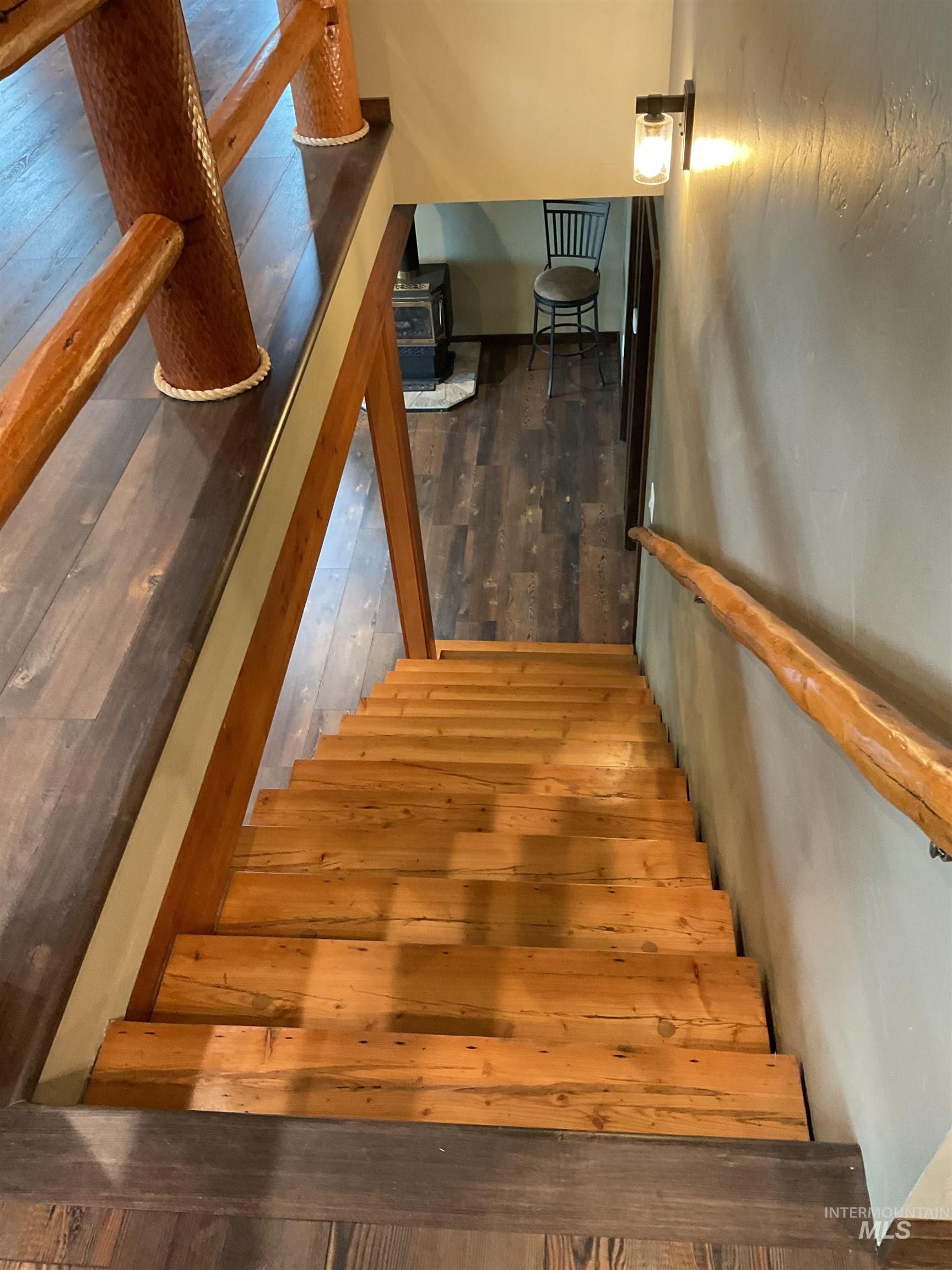 6125 Freeman Creek Road Lenore, ID 83541 - Photo 25 of 44 Covered porch with wood-finish flooring and log siding