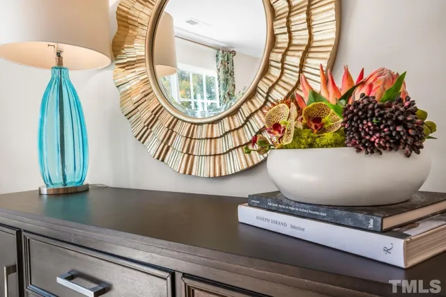 a vase of flowers sitting on a table