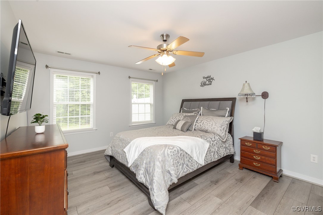 2165 Kennington Park Road, Unit 6 Aylett, VA 23009 - Photo 17 of 36 Bedroom featuring light LVP flooring and ceiling f