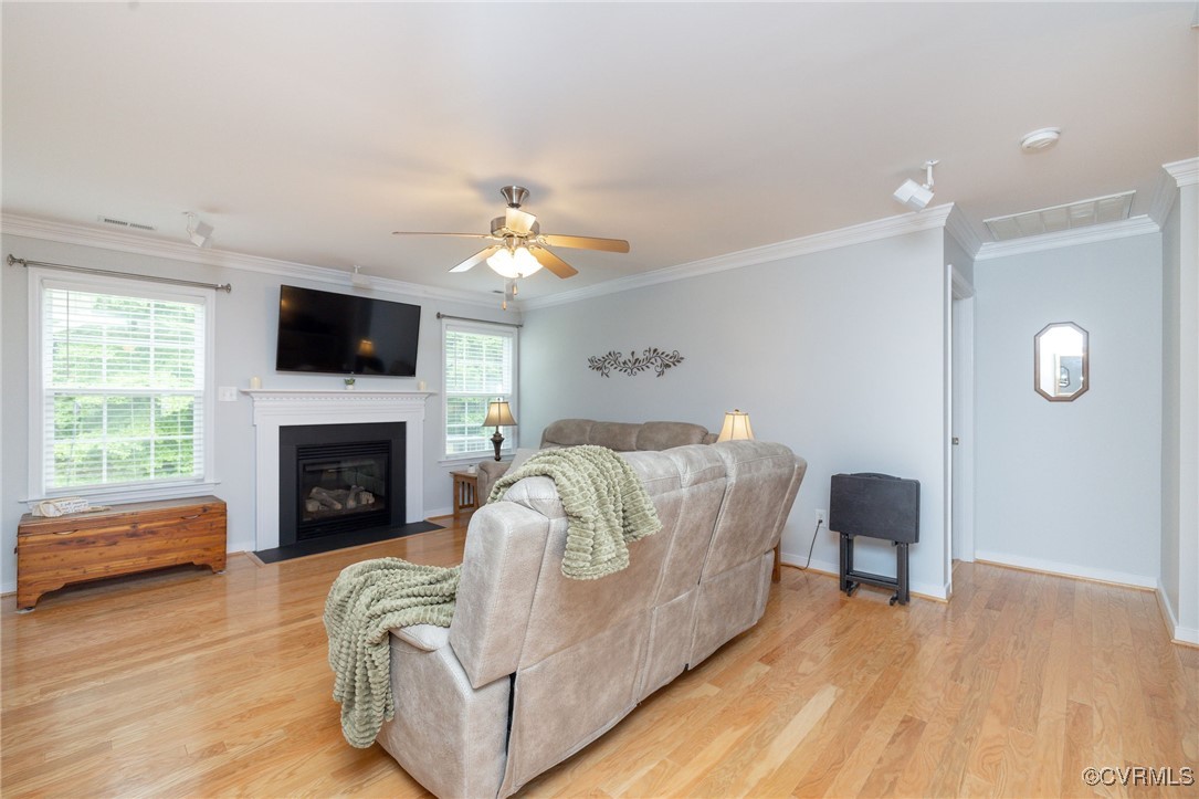 2165 Kennington Park Road, Unit 6 Aylett, VA 23009 - Photo 8 of 36 Great room featuring crown molding, ceiling fan, a