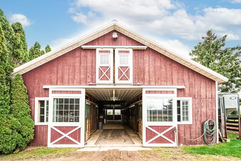 a kitchen with a stove and cabinets