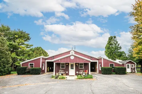 an aerial view of a house with a garden