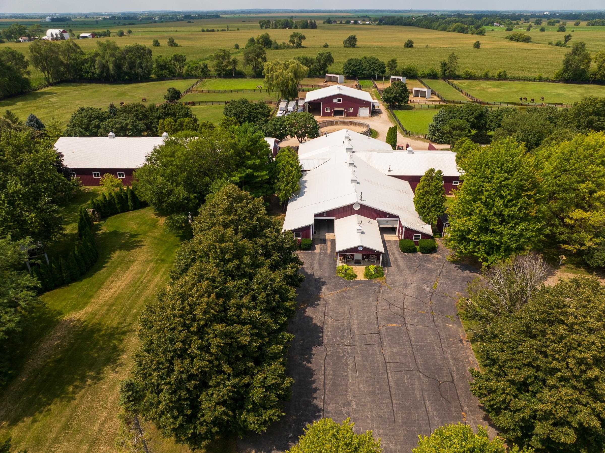 6715 Meyer Road Marengo, IL 60152 - Photo 66 of 72 an aerial view of a house with a garden