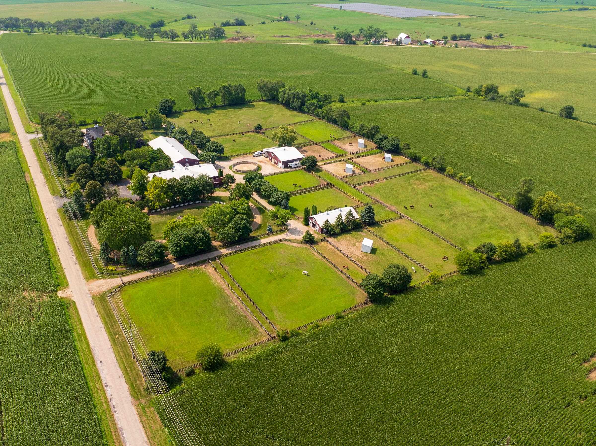 6715 Meyer Road Marengo, IL 60152 - Photo 68 of 72 an aerial view of a residential houses with outdoor space and lake view