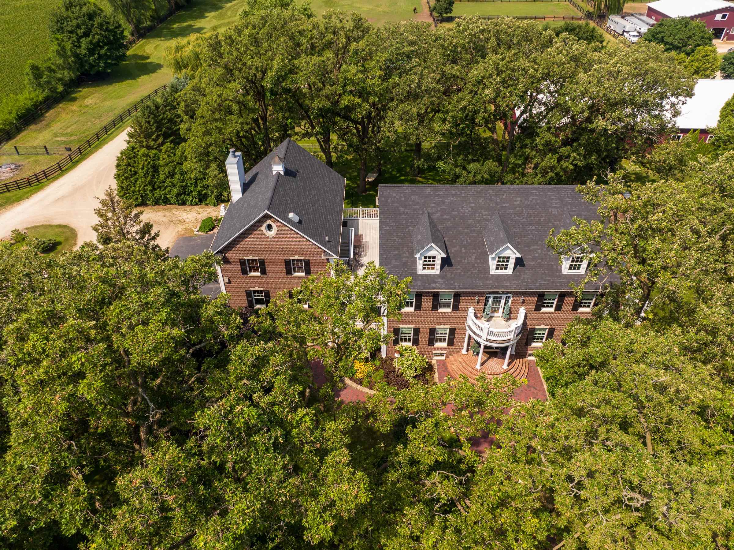 6715 Meyer Road Marengo, IL 60152 - Photo 71 of 72 an aerial view of a house with a garden
