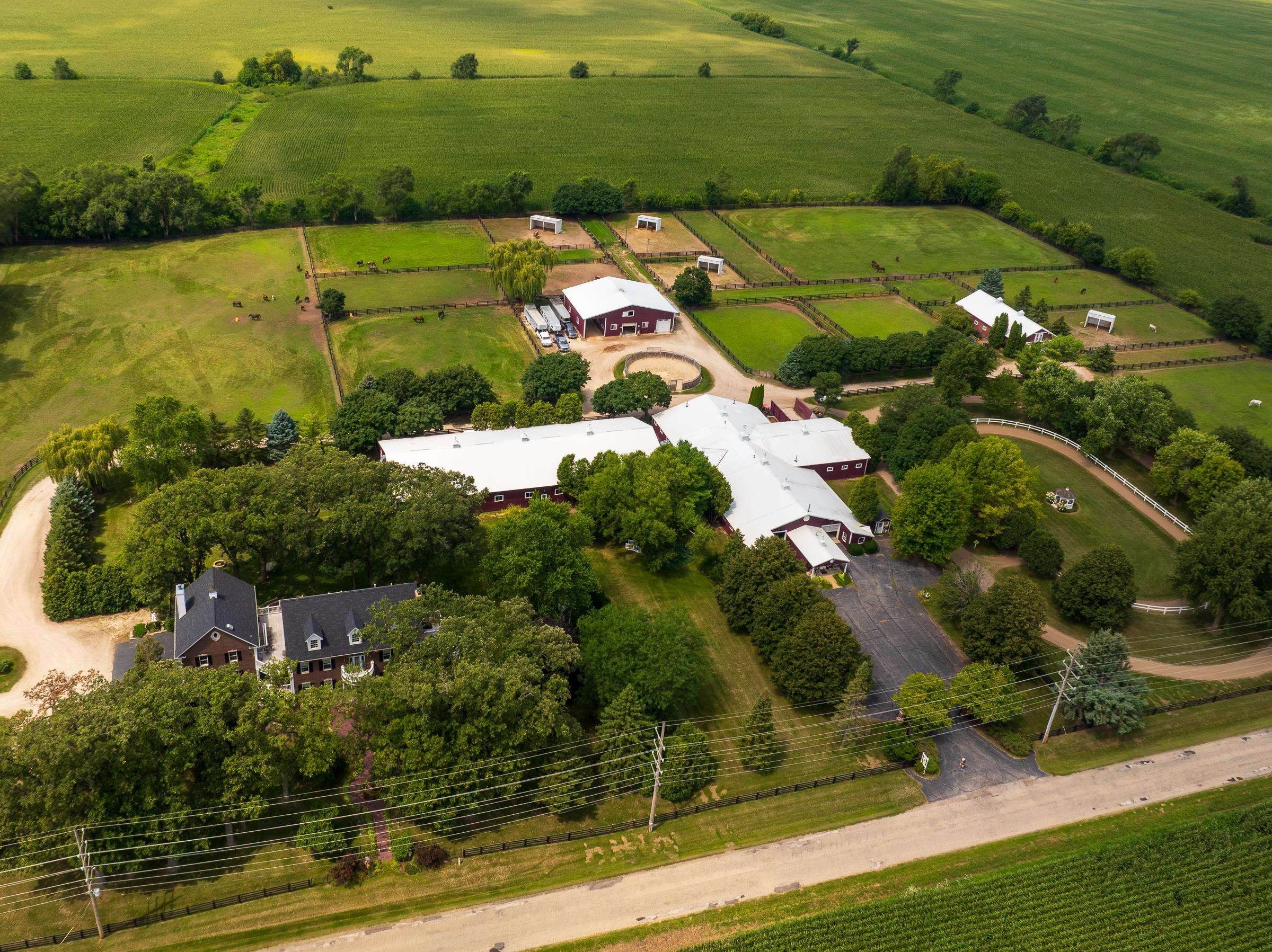 6715 Meyer Road Marengo, IL 60152 - Photo 72 of 72 an aerial view of a houses with a yard