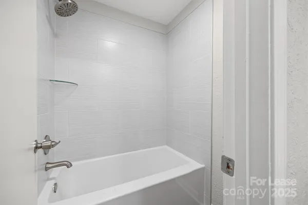 a bathroom with a bathtub