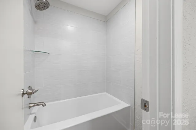 a bathroom with a bathtub