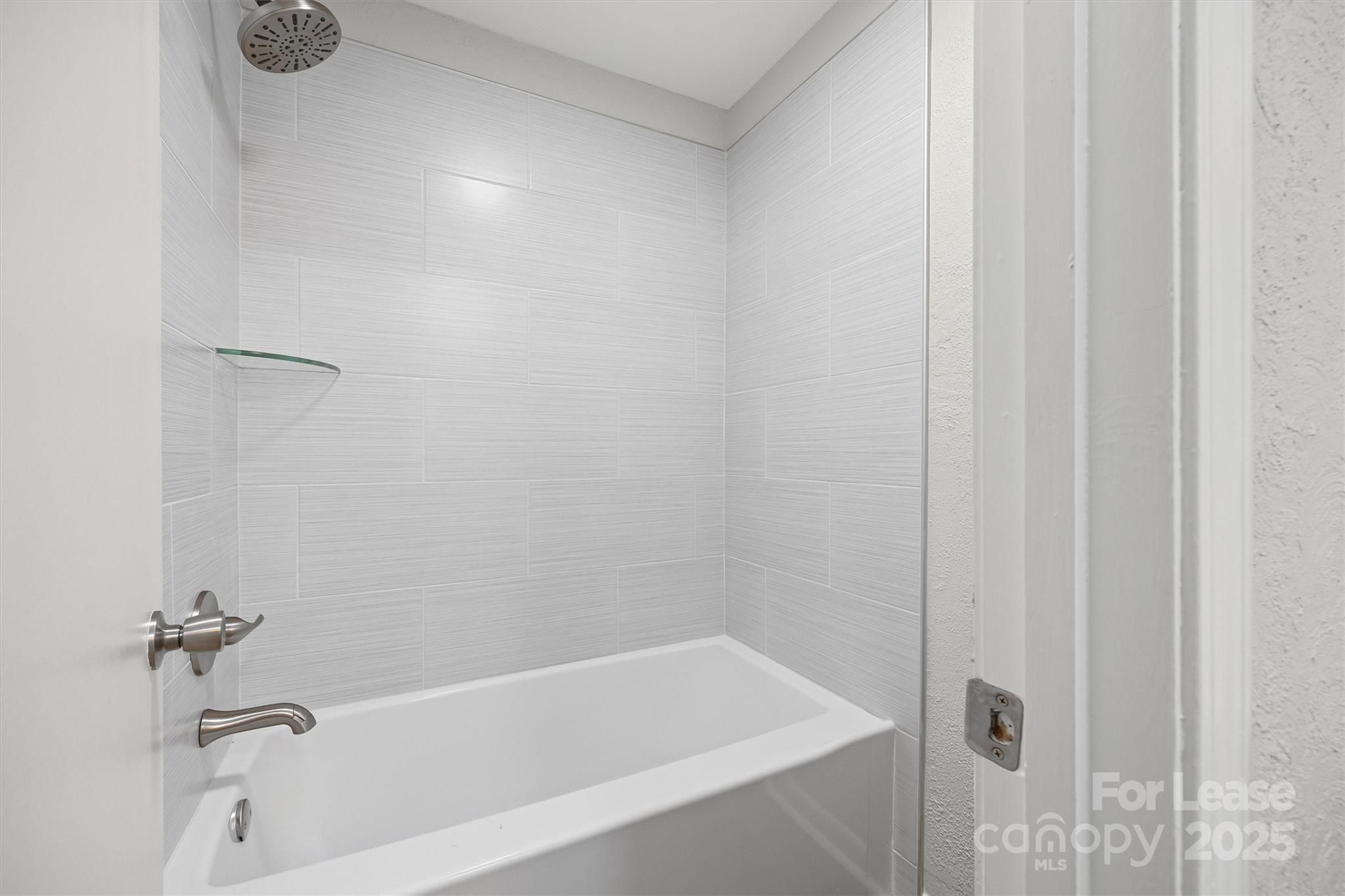 6012 Lanai Lane Fort Mill, SC 29708 - Photo 23 of 32 a bathroom with a bathtub