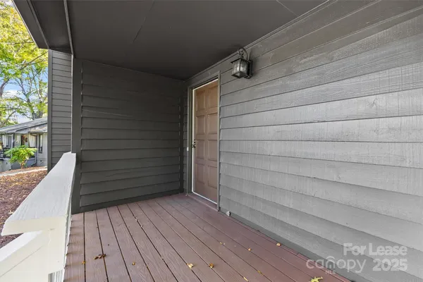 a view of outdoor space and wooden floor