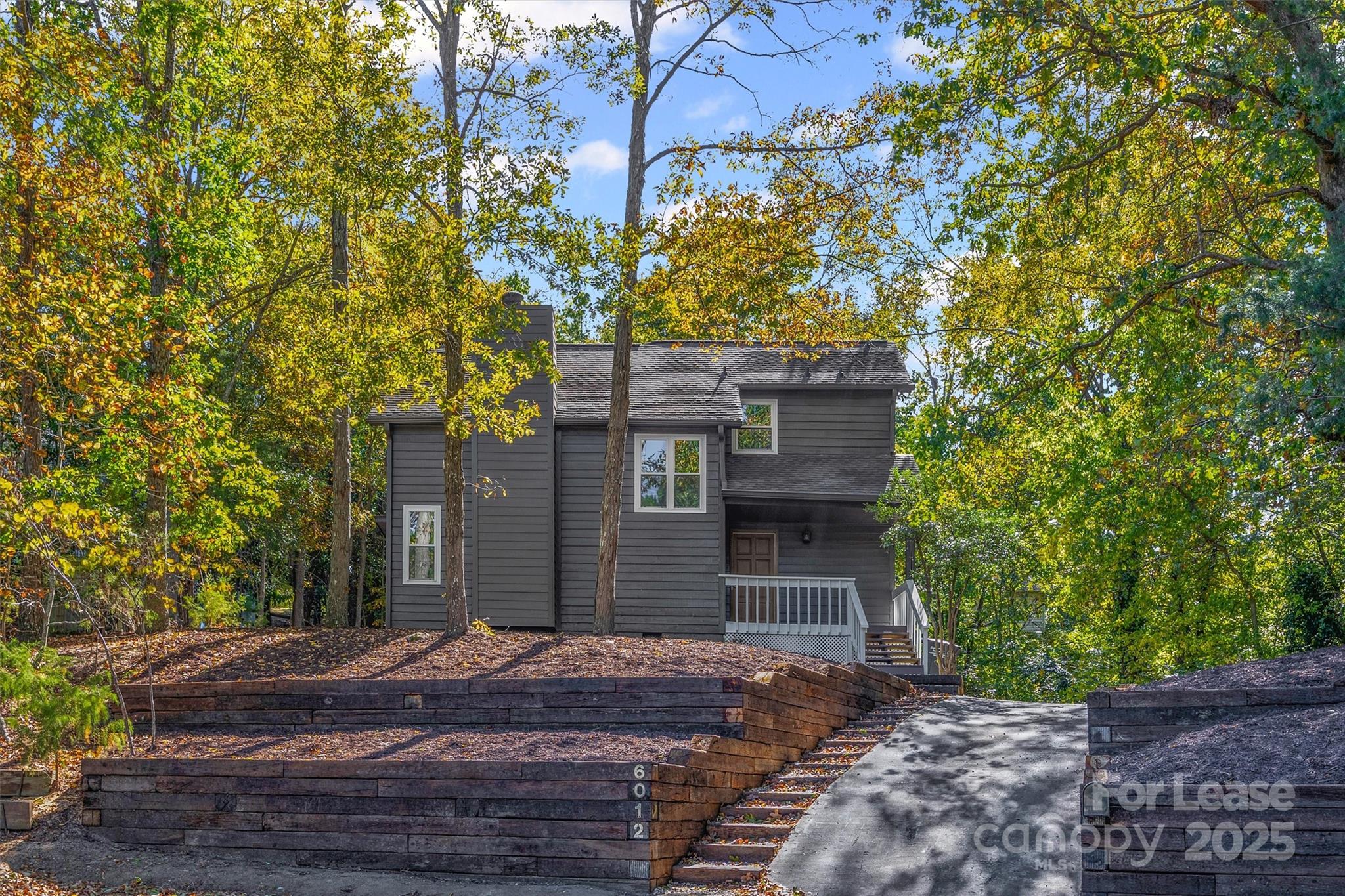 6012 Lanai Lane Fort Mill, SC 29708 - Photo 31 of 32 a front view of a house with a yard