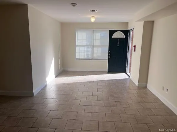 a view of hallway with windows