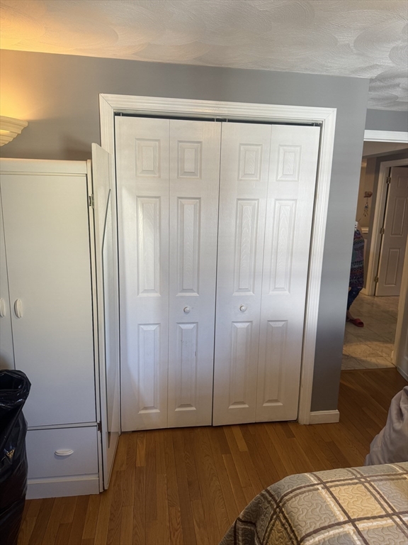 21 Cook, Unit 1 Chelsea, MA 02150 - Photo 16 of 32 a view of entryway with wooden floor