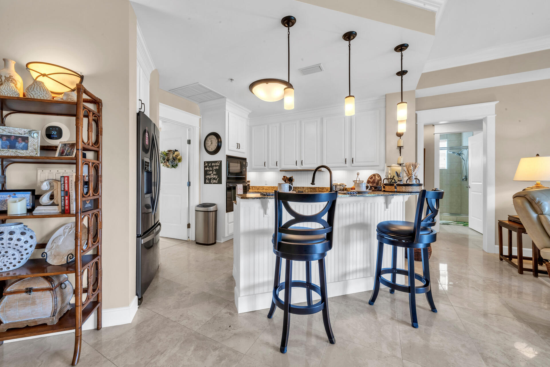 5357 Pine Ridge Lane, Unit 5357 Miramar Beach, FL 32550 - Photo 14 of 53 a dining room filled with furniture and a chandelier