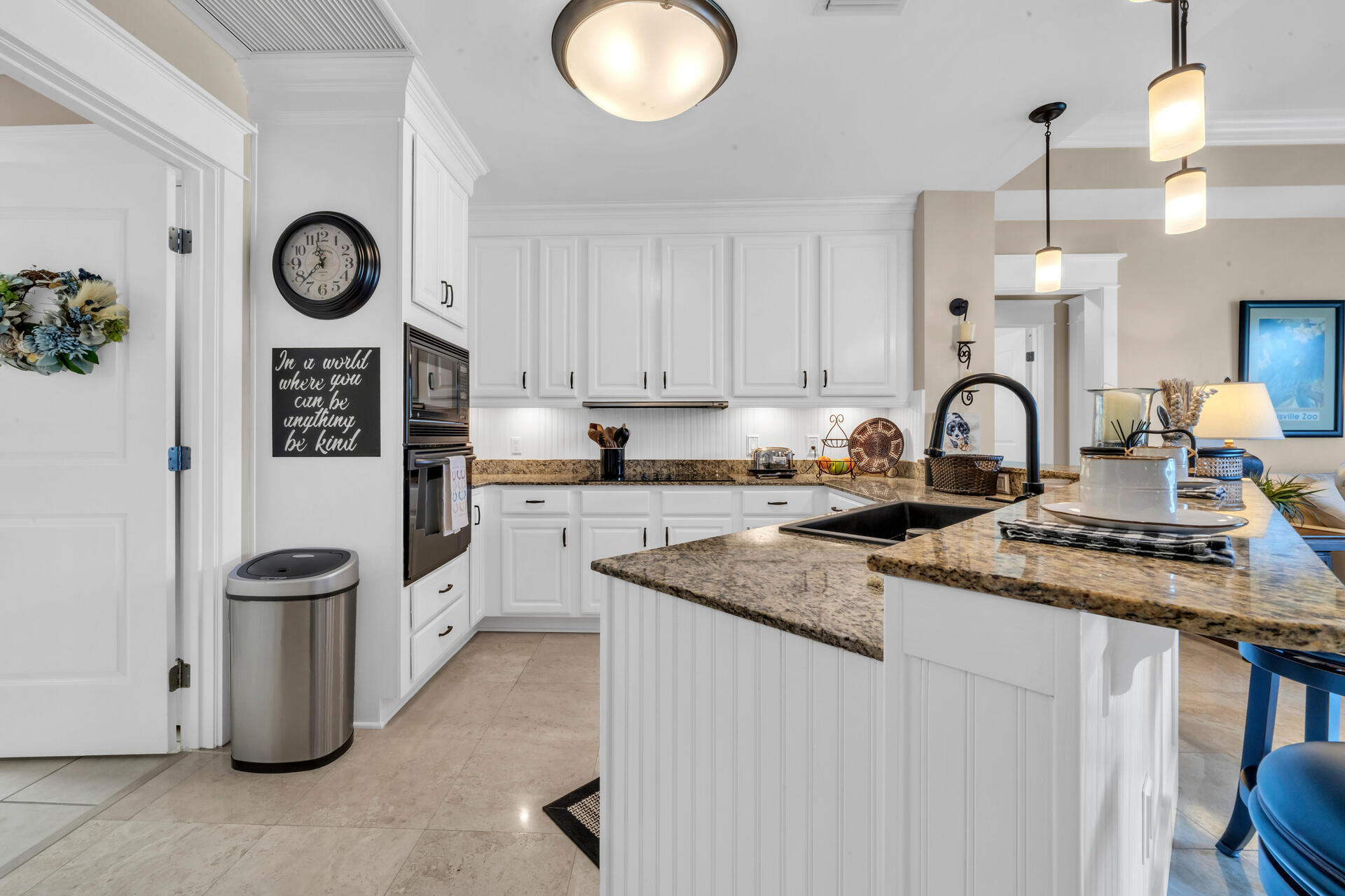 5357 Pine Ridge Lane, Unit 5357 Miramar Beach, FL 32550 - Photo 18 of 53 a kitchen with stainless steel appliances granite countertop a sink a stove top oven a counter space and cabinets