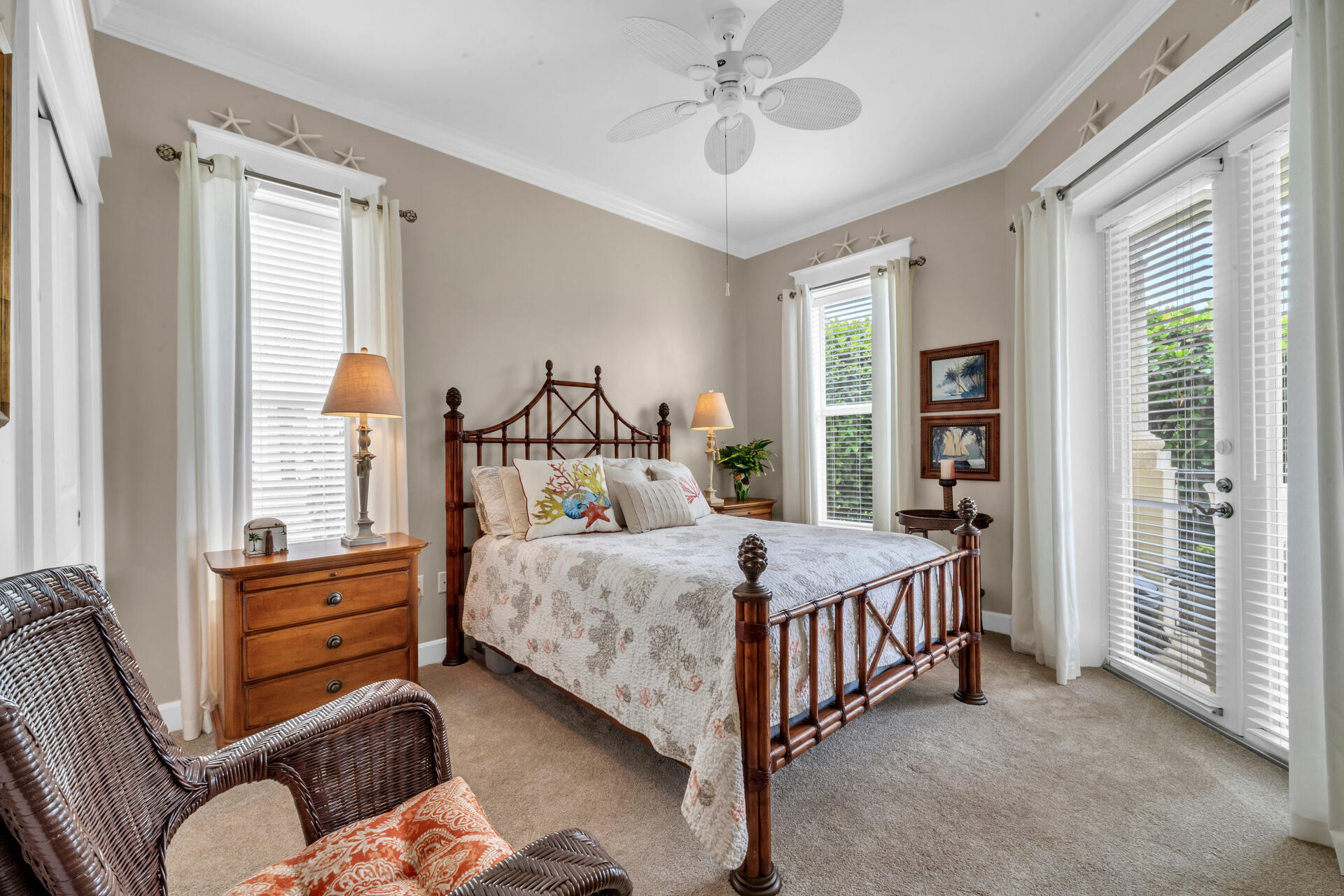 5357 Pine Ridge Lane, Unit 5357 Miramar Beach, FL 32550 - Photo 31 of 53 a bedroom with a bed and a chandelier