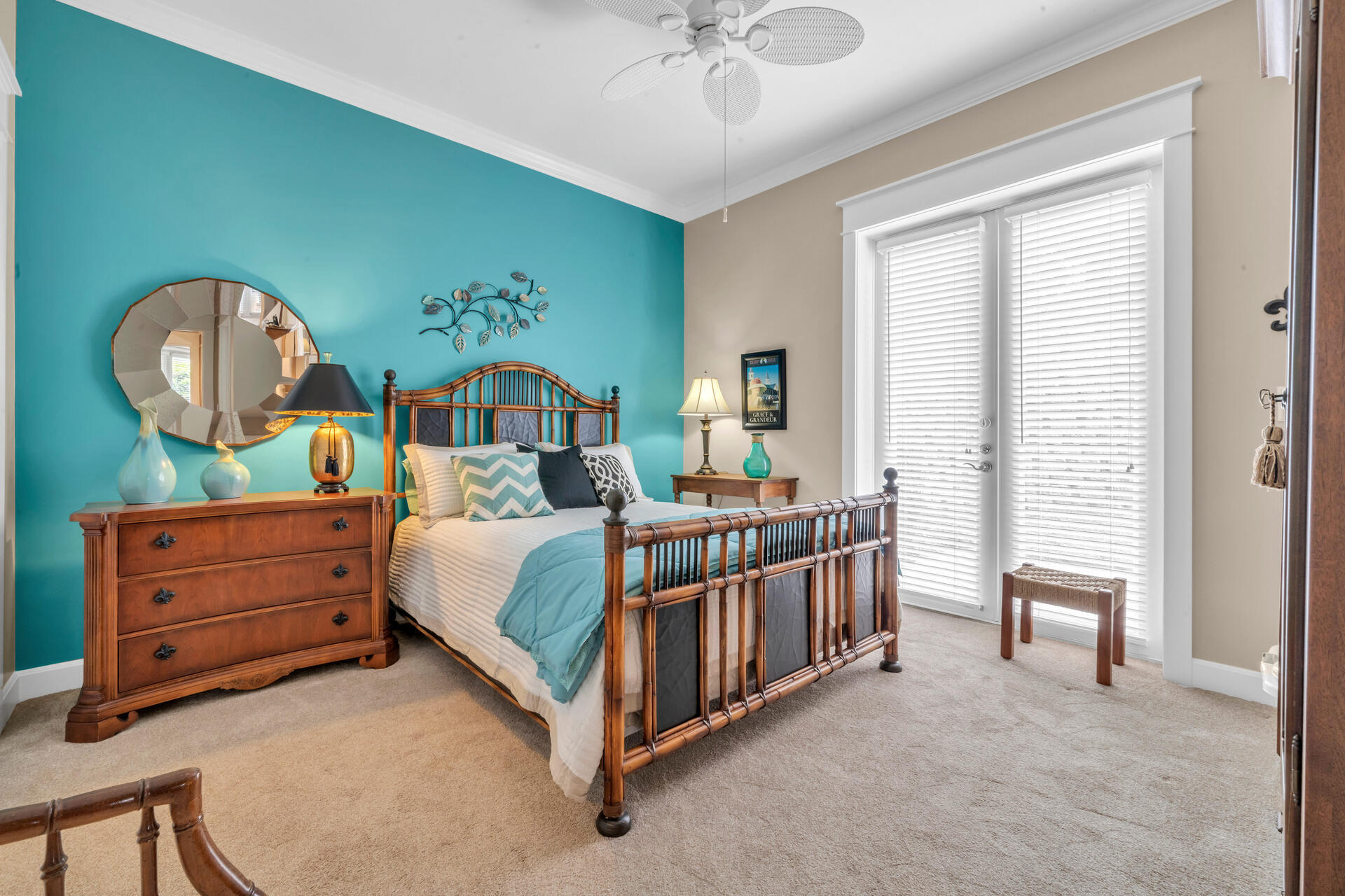 5357 Pine Ridge Lane, Unit 5357 Miramar Beach, FL 32550 - Photo 34 of 53 a bedroom with a bed and a chandelier