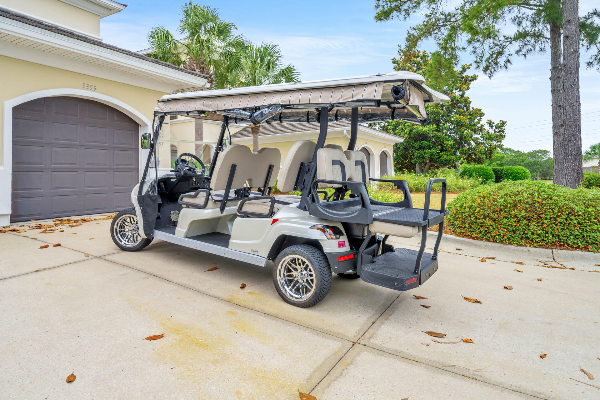 5357 Pine Ridge Lane, Unit 5357 Miramar Beach, FL 32550 - Photo 51 of 53 a view of a patio with table and chairs and potted plants
