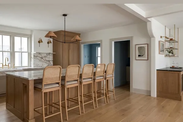 a dining room with furniture window wooden floor