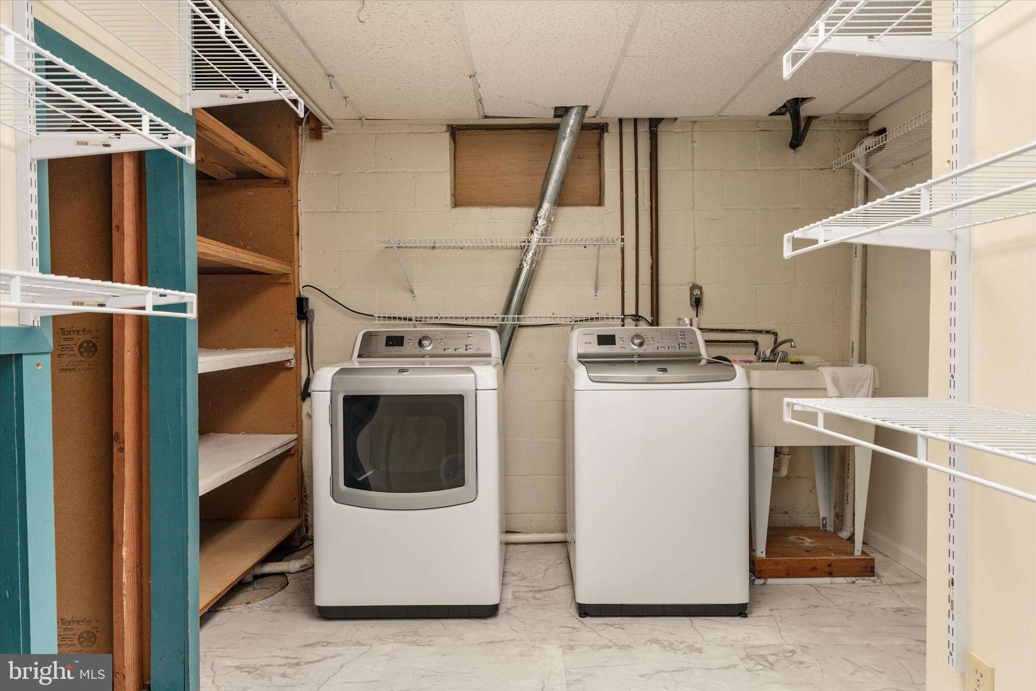 596 Forest View Road Linthicum Heights, MD 21090 - Photo 27 of 42 Laundry Room w/Storage & Hanging Racks
