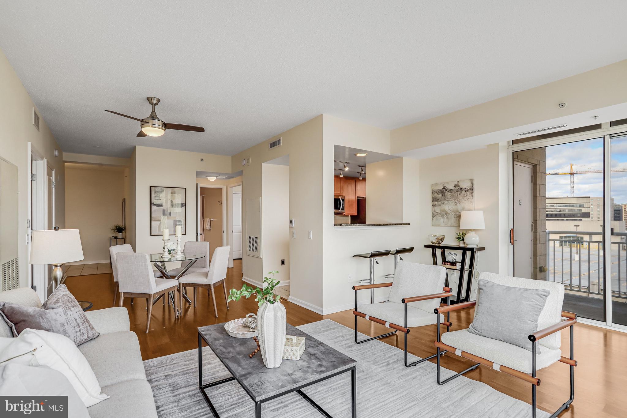 930 Wayne Avenue, Unit 1009 Silver Spring, MD 20910 - Photo 6 of 42 Great flow from main living area to balcony perch!