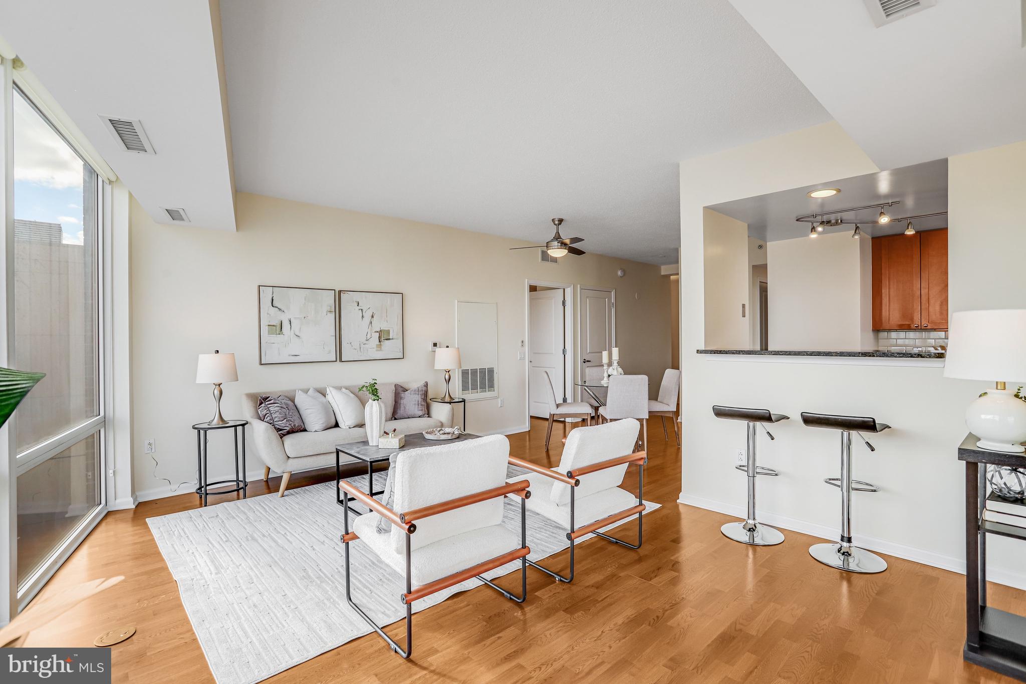 930 Wayne Avenue, Unit 1009 Silver Spring, MD 20910 - Photo 7 of 42 Kitchen opens to living room.