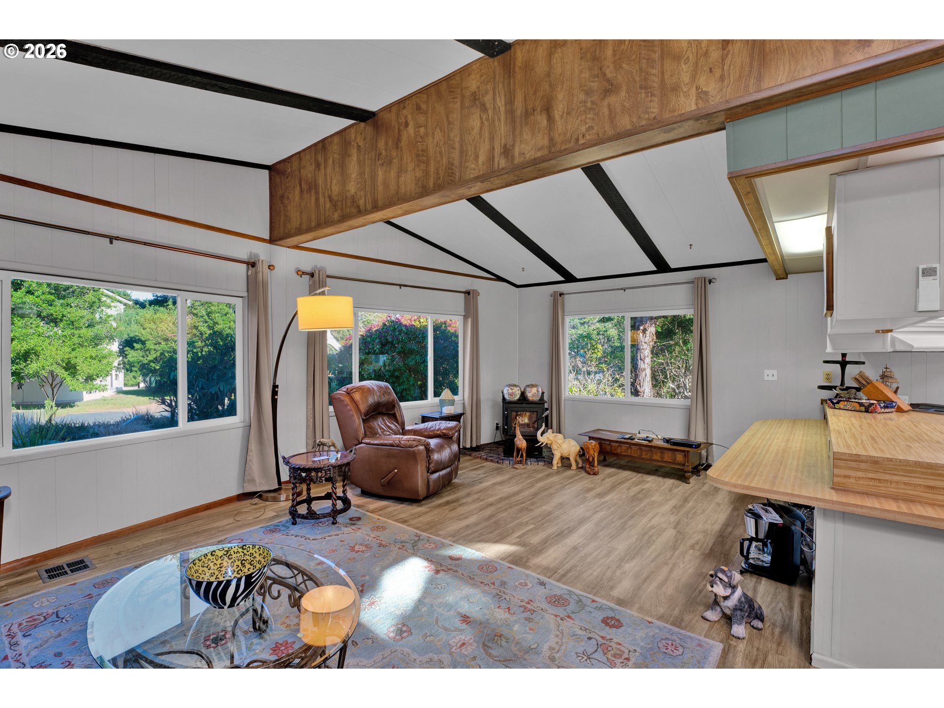 1601 Rhododendron Drive, Unit 534 Florence, OR 97439 - Photo 14 of 48 a bed room with a bed and a window