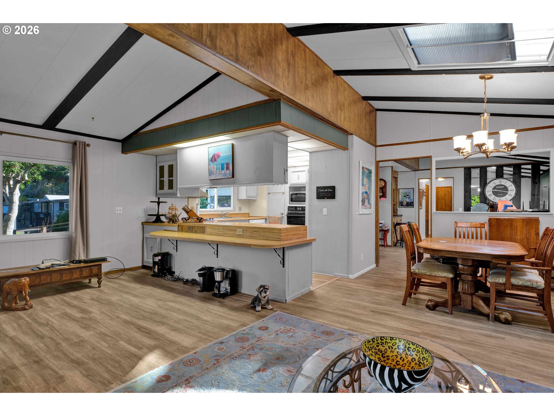 1601 Rhododendron Drive, Unit 534 Florence, OR 97439 - Photo 15 of 48 a living room with stainless steel appliances kitchen island granite countertop furniture and a kitchen view