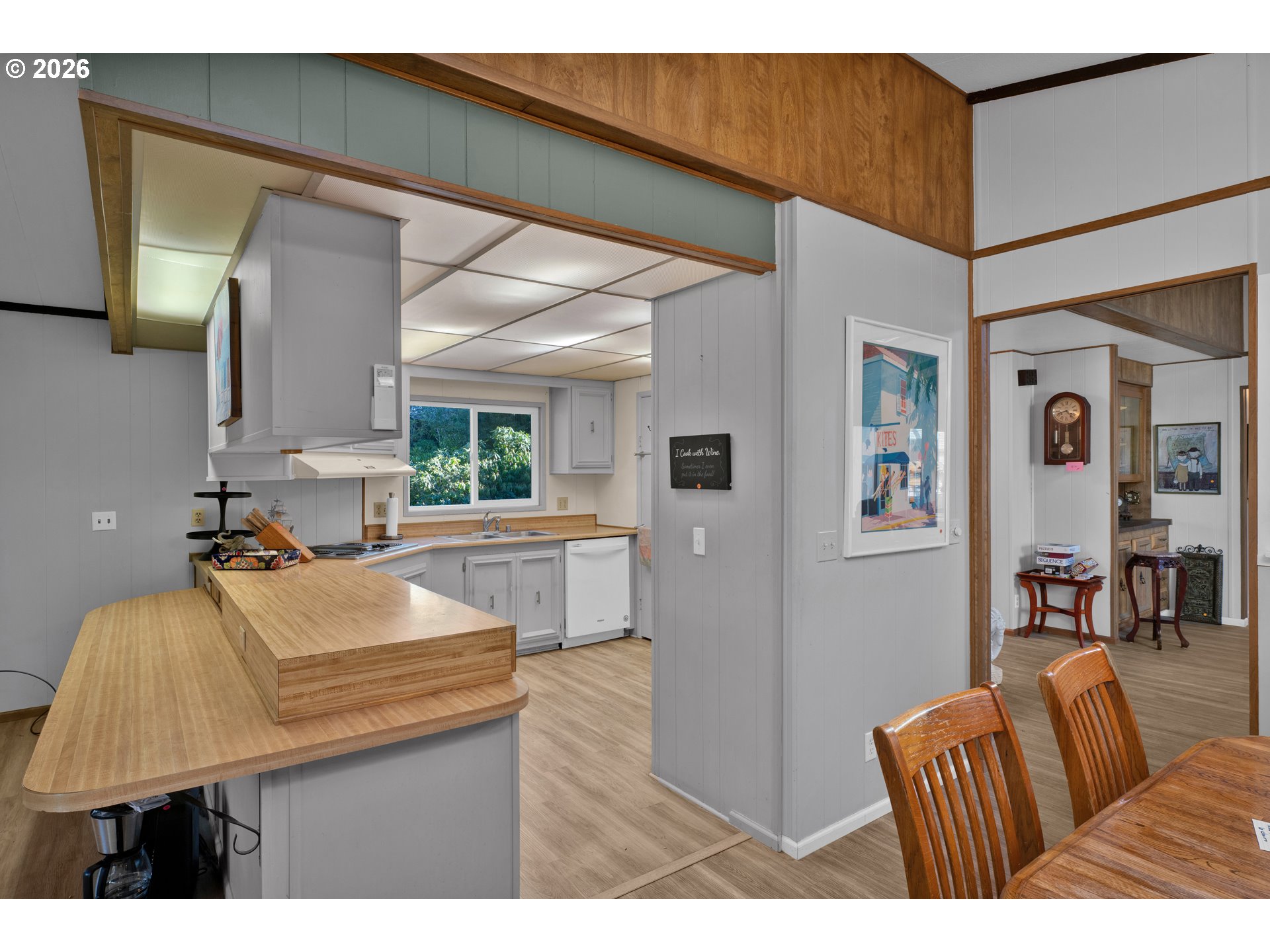 1601 Rhododendron Drive, Unit 534 Florence, OR 97439 - Photo 16 of 48 a living room with furniture and a wooden floor