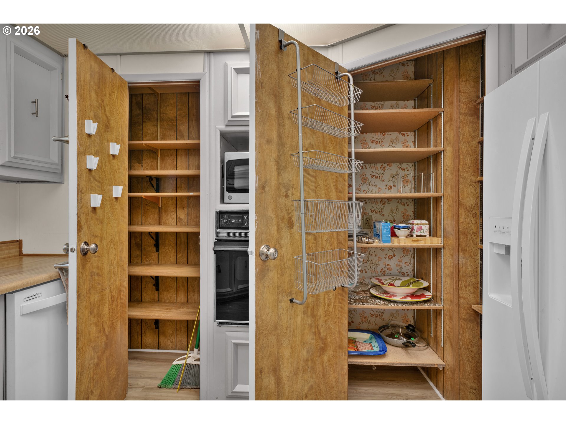 1601 Rhododendron Drive, Unit 534 Florence, OR 97439 - Photo 19 of 48 a view of cabinet with window and shelf