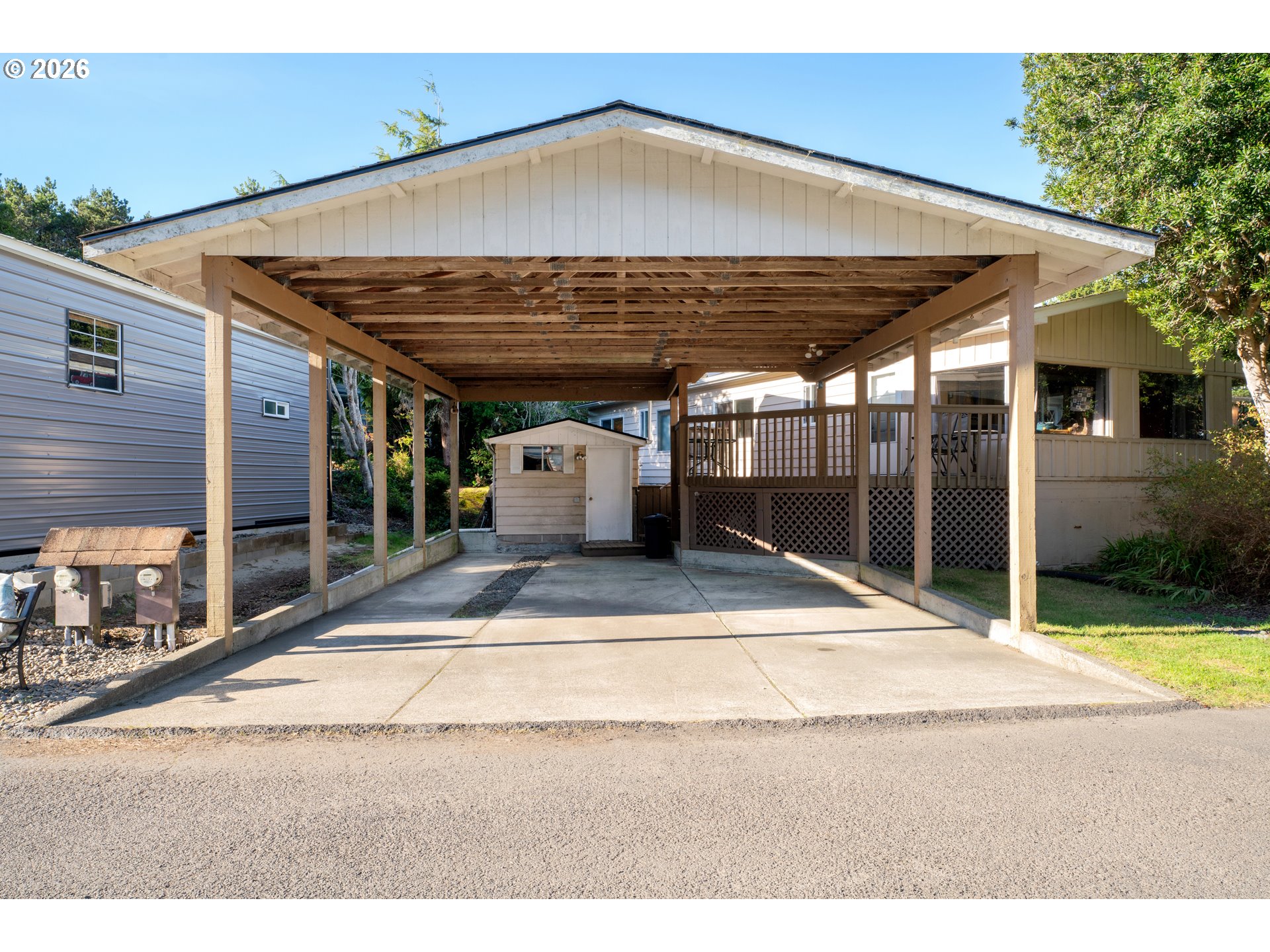 1601 Rhododendron Drive, Unit 534 Florence, OR 97439 - Photo 2 of 48 a view of a backyard of the house