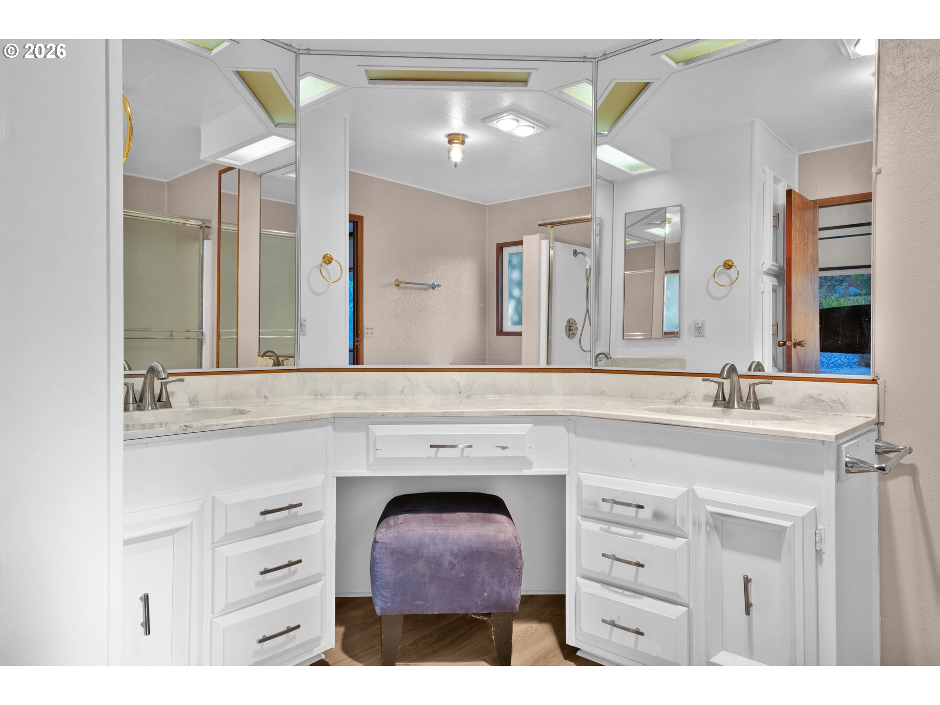 1601 Rhododendron Drive, Unit 534 Florence, OR 97439 - Photo 24 of 48 a bathroom with a sink vanity and a mirror