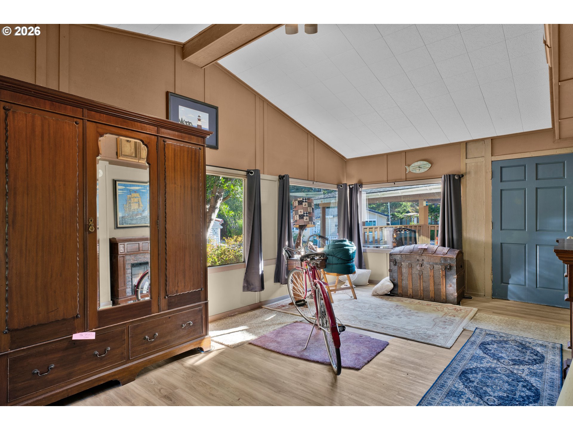 1601 Rhododendron Drive, Unit 534 Florence, OR 97439 - Photo 32 of 48 a living room with furniture and large window