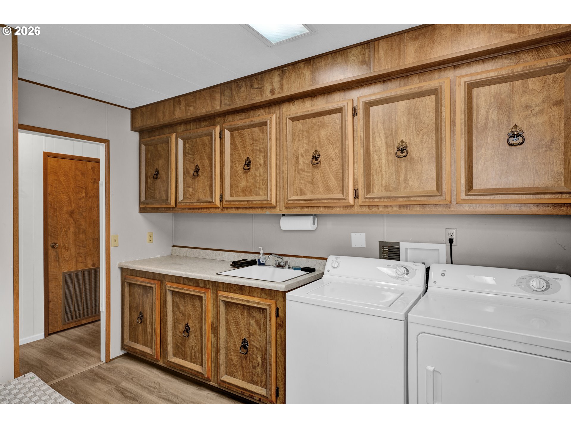 1601 Rhododendron Drive, Unit 534 Florence, OR 97439 - Photo 35 of 48 a utility room with dryer and washer