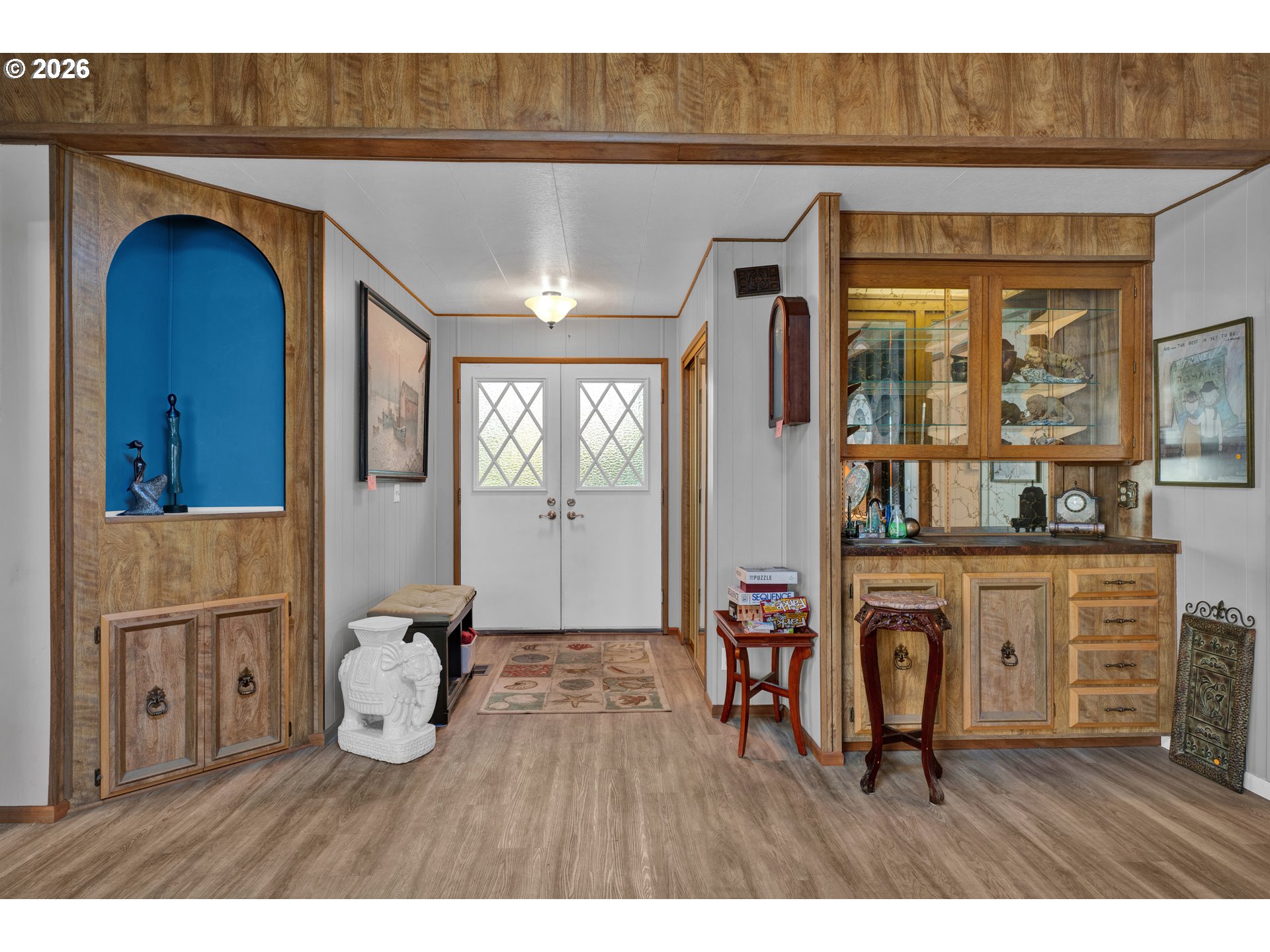 1601 Rhododendron Drive, Unit 534 Florence, OR 97439 - Photo 8 of 48 a living room with furniture and a wooden floor