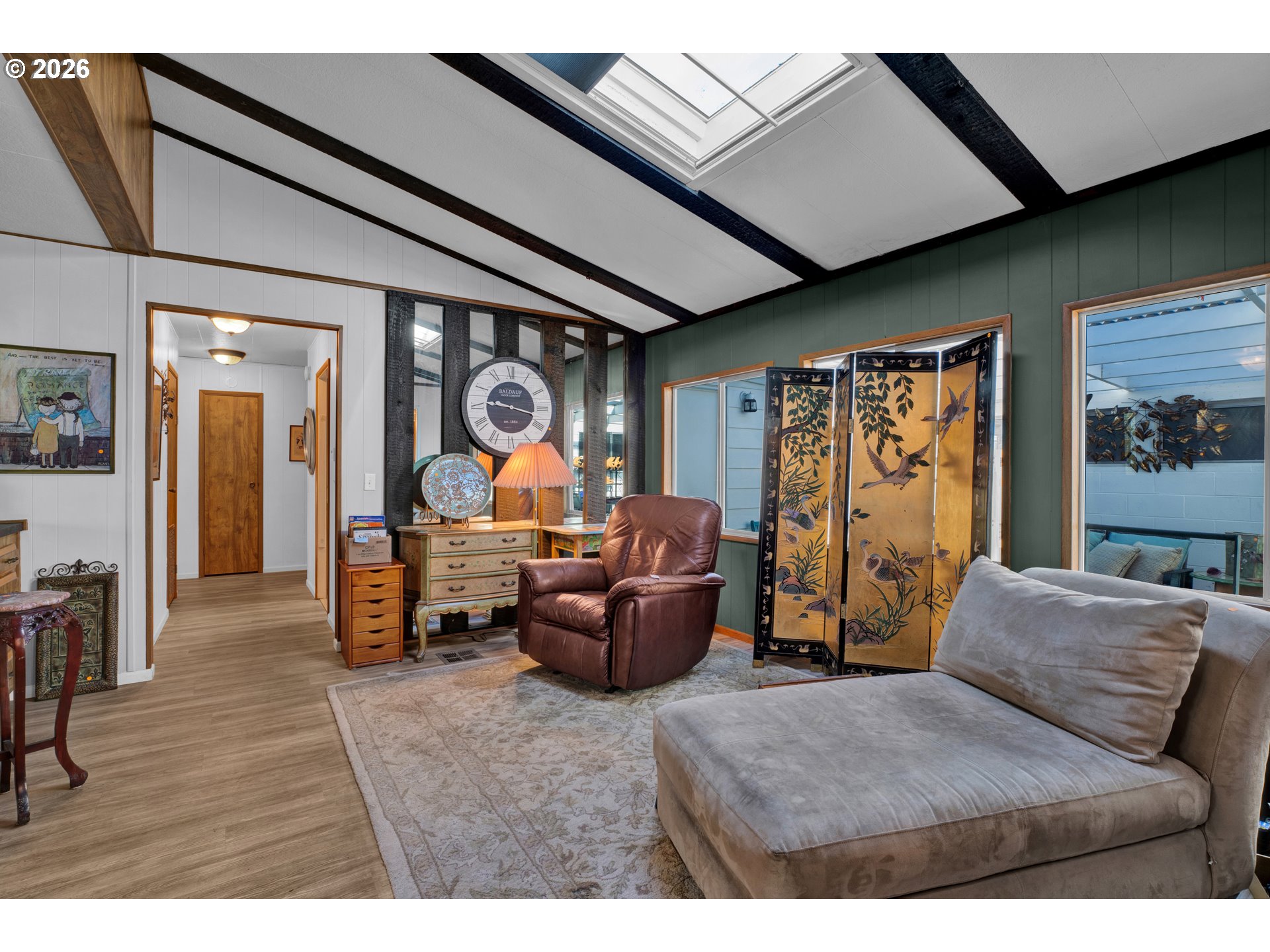 1601 Rhododendron Drive, Unit 534 Florence, OR 97439 - Photo 9 of 48 a living room with furniture and a large window