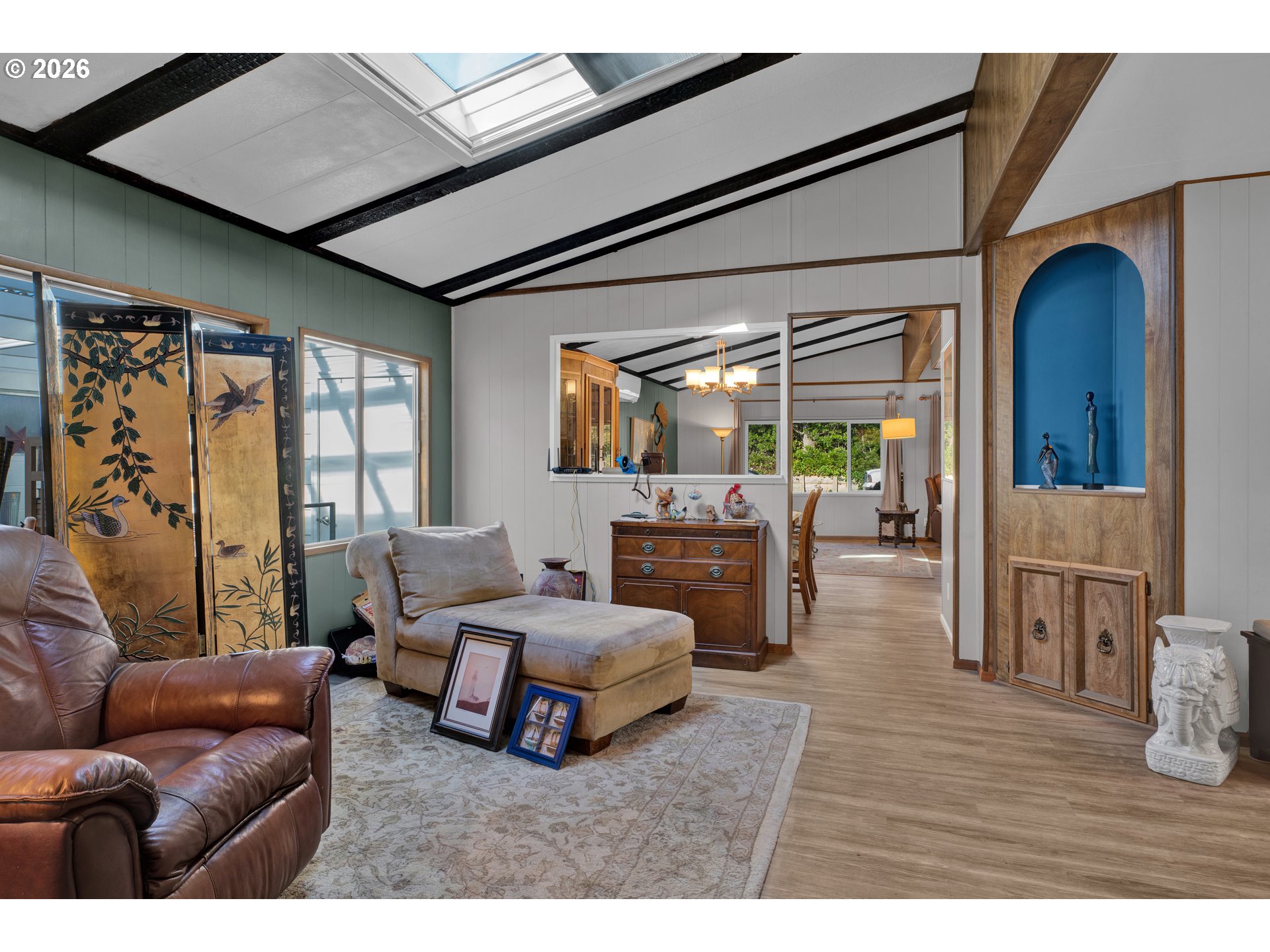 1601 Rhododendron Drive, Unit 534 Florence, OR 97439 - Photo 10 of 48 a living room with furniture and a large window