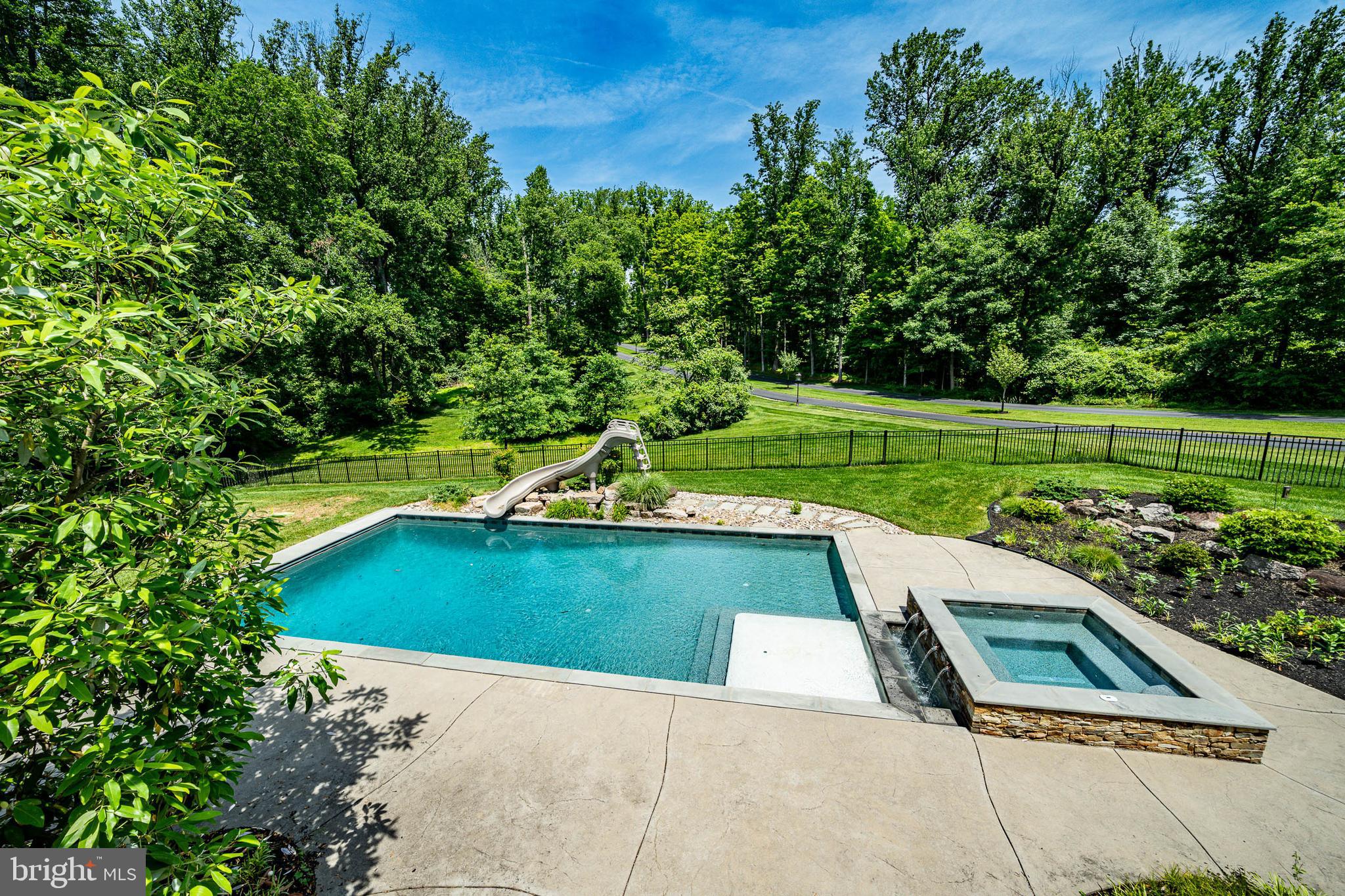57 Sweetwater Road Glen Mills, PA 19342 - Photo 90 of 106 Salt Water Pool with water slide and hot tub